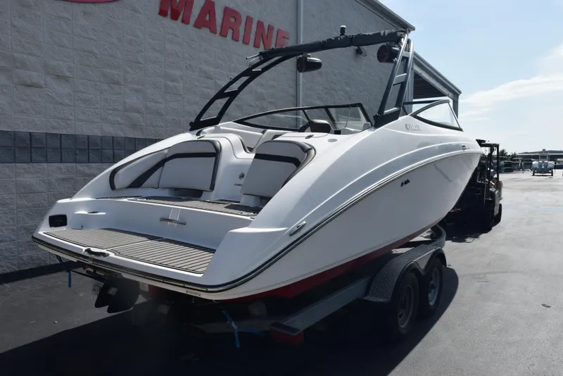 Slide: The Image of 2017 Yamaha Boats AR240 on trailer, parked outside marine dealership. - 4