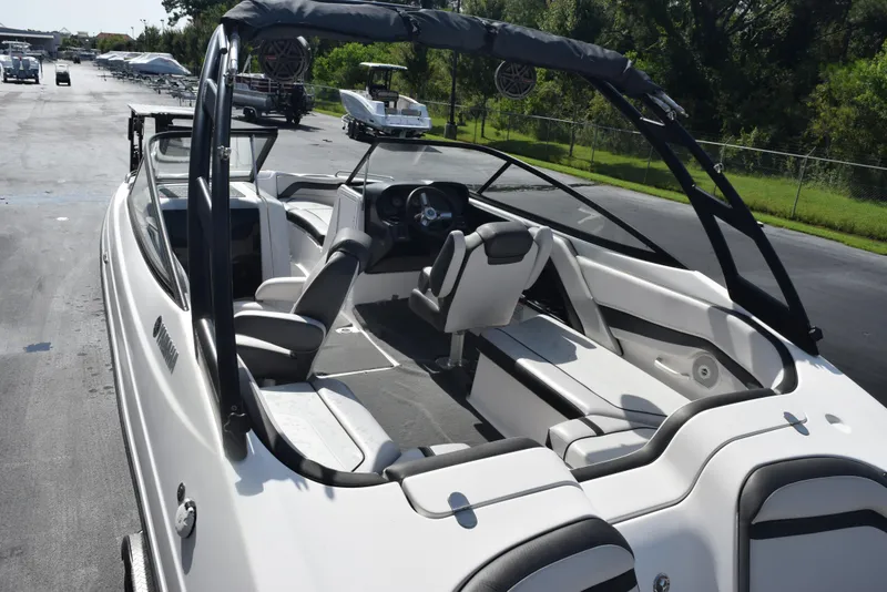 Slide: The Image of 2017 Yamaha Boats AR240 interior with sleek seating and modern design. - 8