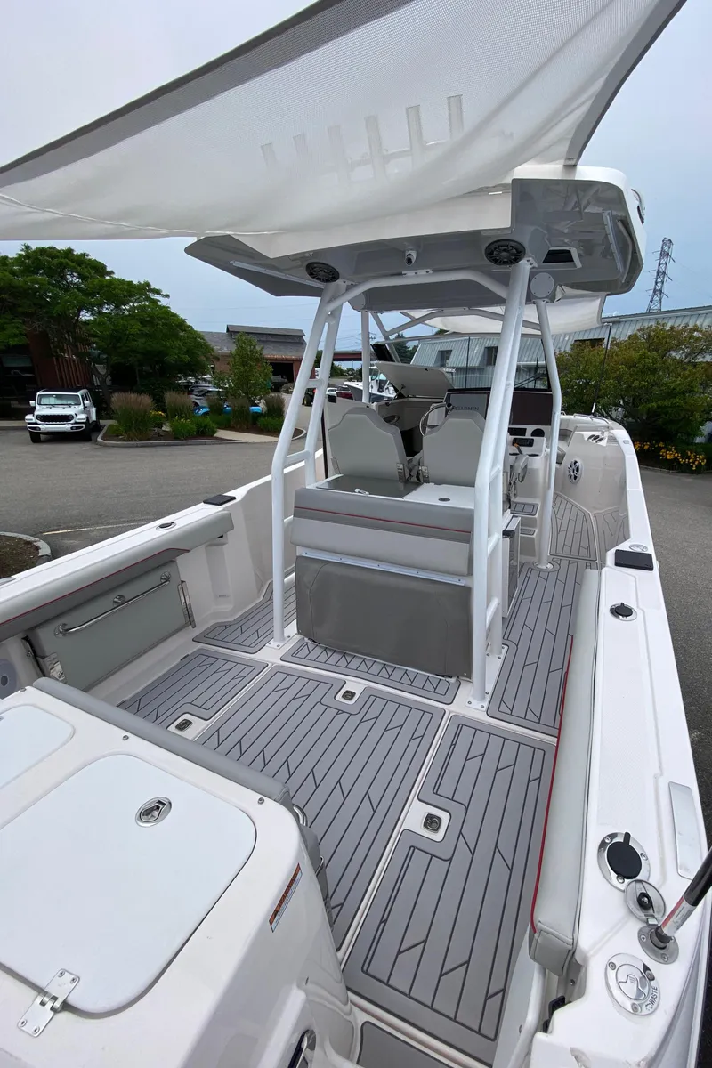 Slide: The Image of 2025 Solara S-250 CW boat with sleek deck design and modern seating. - 4