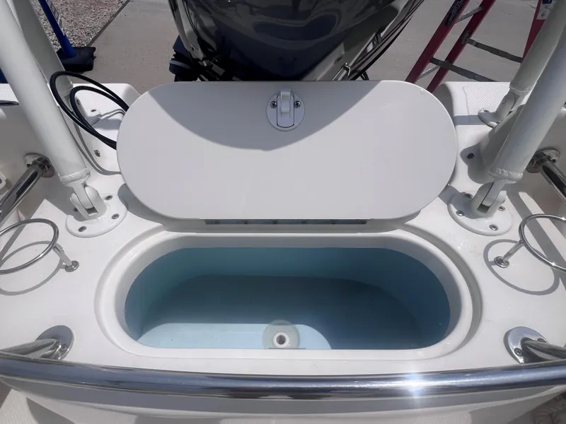 Slide: The Image of Livewell on a 2016 Key West 186 Dual Console boat, open lid, showing interior. - 5