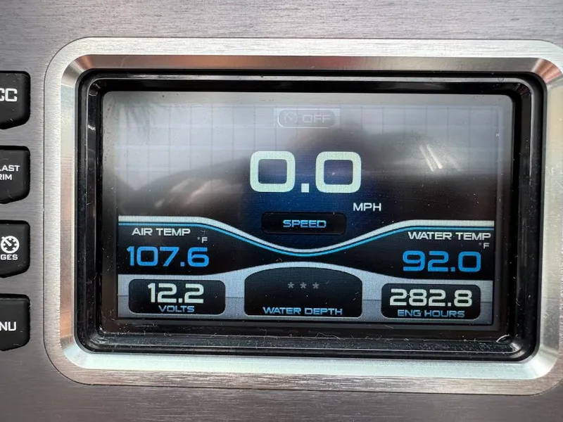 Slide: The Image of MasterCraft XT23 2018 dashboard display showing temperature, speed, and engine hours. - 14
