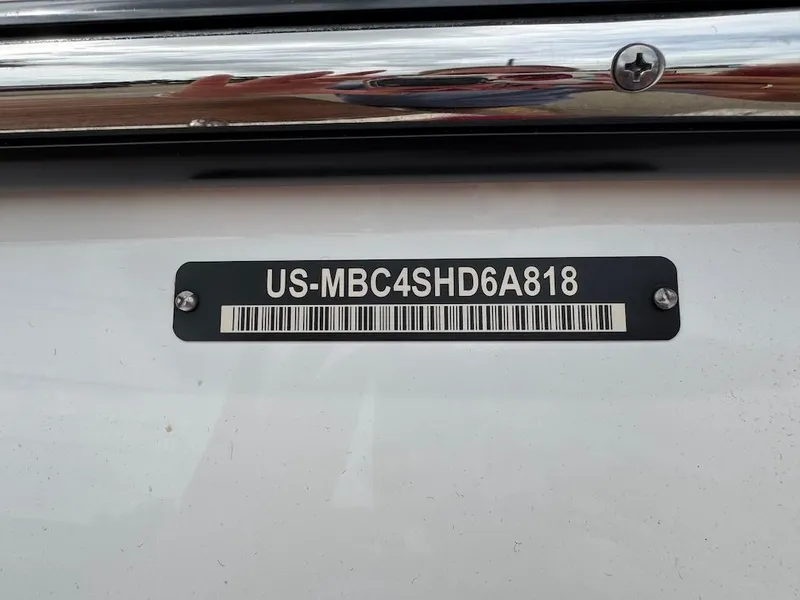 Slide: The Image of 2018 MasterCraft XT23 boat identification plate with serial number and barcode. - 15