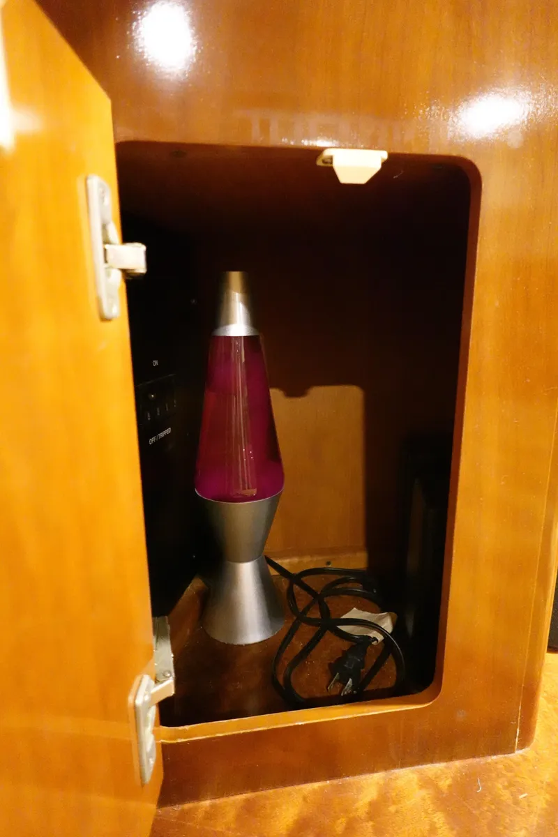 Slide: The Image of Lava lamp inside wooden cabinet on 2004 Carver 396 Aft Cabin MY boat. - 31