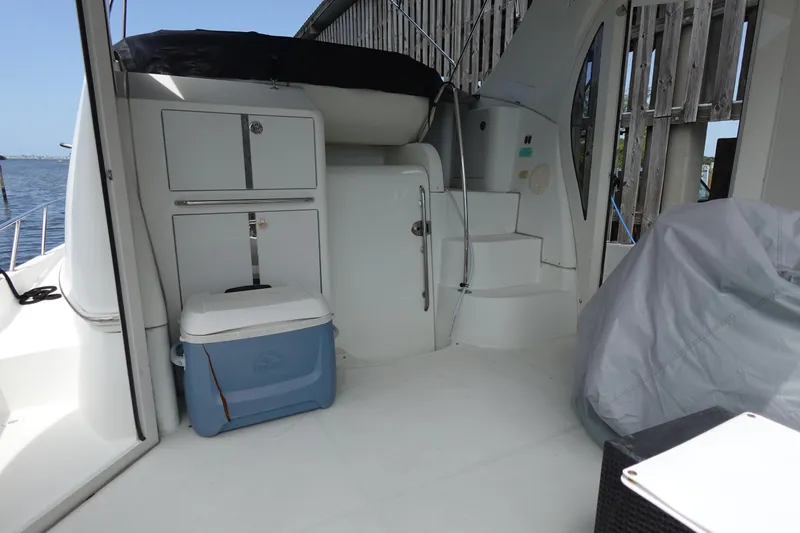 Slide: The Image of 2004 Carver 396 Aft Cabin MY boat interior with cooler and storage cabinets. - 6