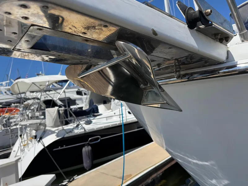 Slide: The Image of Close-up of a Nova 48 boat anchor, docked at a marina, sunny day. - 3