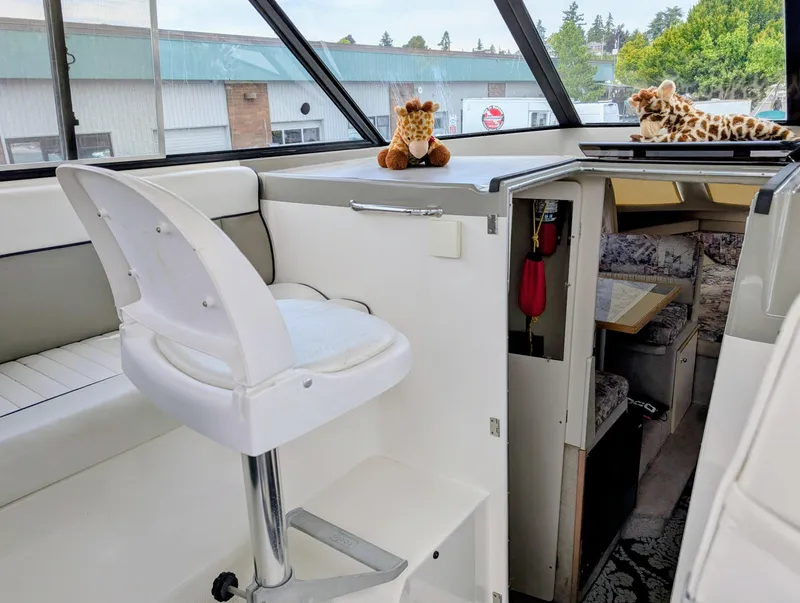 Slide: The Image of Interior of a 1997 Bayliner 2859 Ciera Express boat with seating and cabin view. - 20
