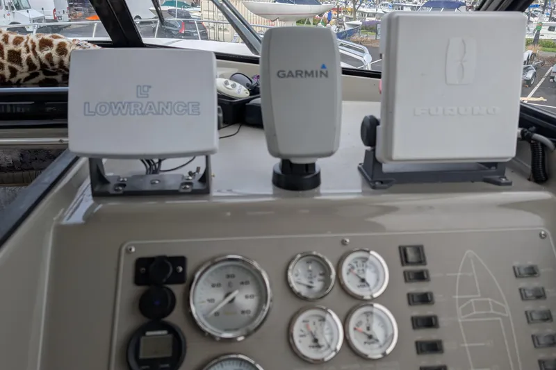 Slide: The Image of Dashboard of a 1997 Bayliner 2859 Ciera Express with Lowrance, Garmin, and Furuno devices. - 22