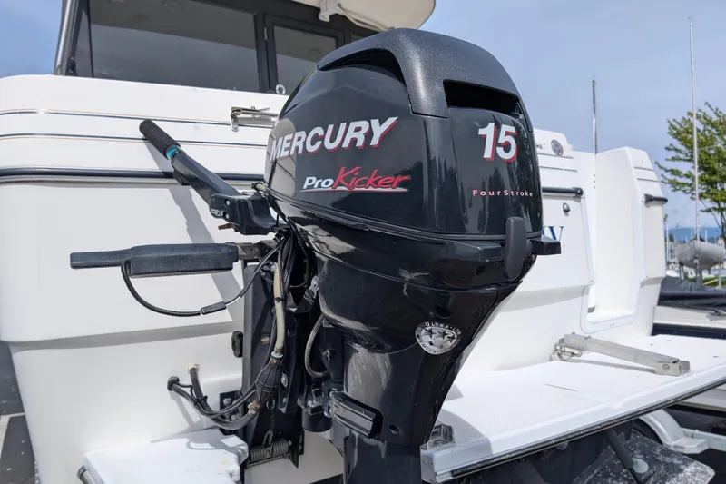 Slide: The Image of 1997 Bayliner 2859 Ciera Express with Mercury ProKicker 15 FourStroke outboard motor. - 4
