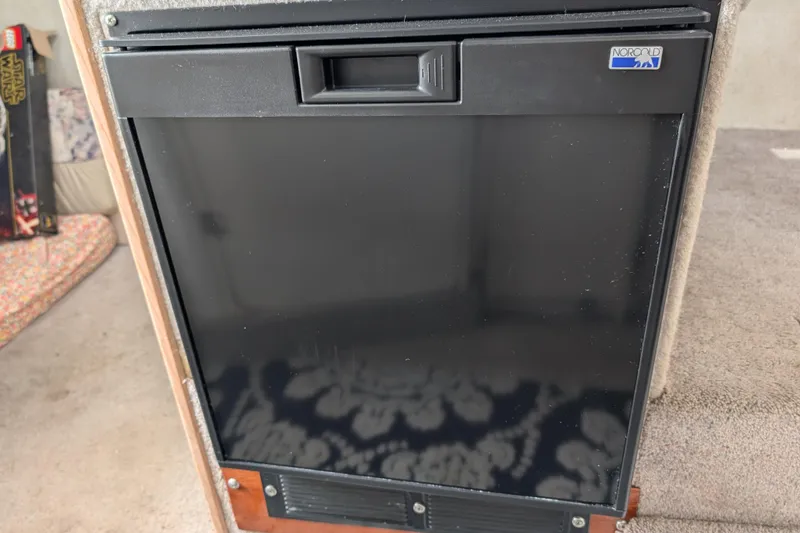 Slide: The Image of Norcold refrigerator in 1997 Bayliner 2859 Ciera Express boat interior. - 42