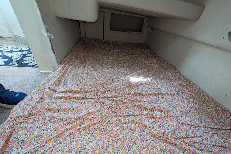 Slide: The Image of Interior cabin of 1997 Bayliner 2859 Ciera Express with floral bedspread. - 47