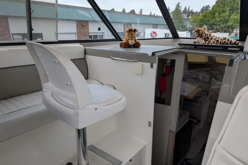 Slide: The Image of Interior of a 1997 Bayliner 2859 Ciera Express with plush giraffe toys. - 51