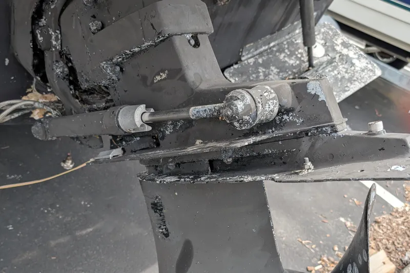 Slide: The Image of Close-up of 1997 Bayliner 2859 Ciera Express boat engine with visible wear. - 8