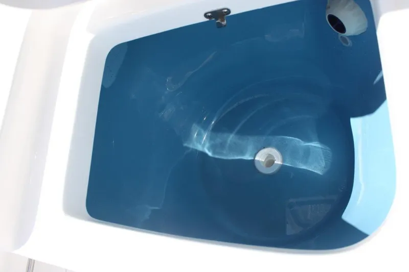 Slide: The Image of Livewell of 2025 Tidewater 320 CC Adventure boat, filled with water. - 23