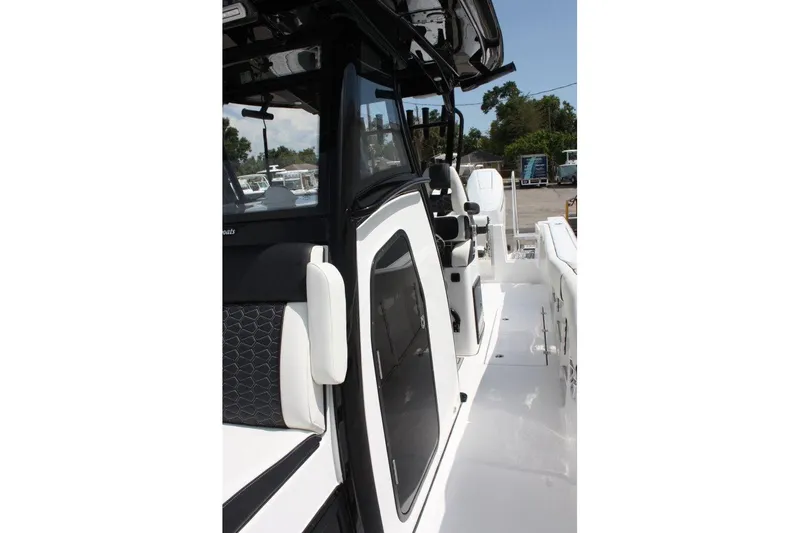 Slide: The Image of 2025 Tidewater 320 CC Adventure boat interior with sleek design and modern features. - 38