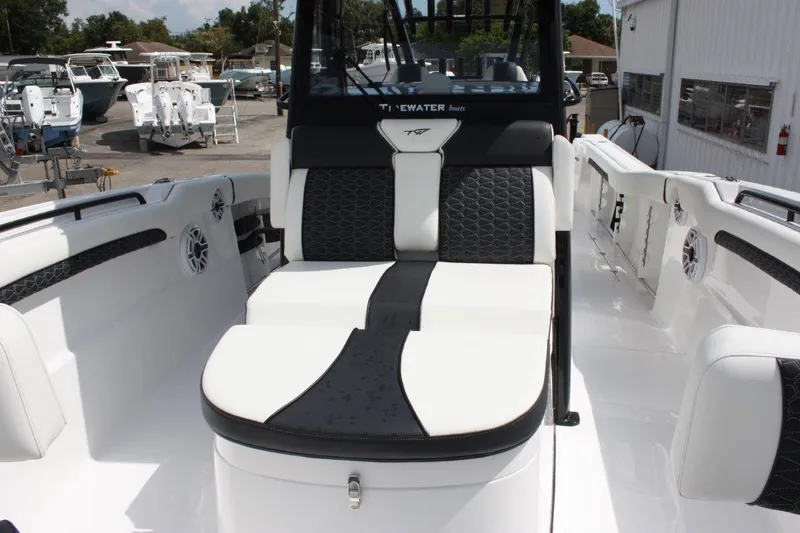 Slide: The Image of 2025 Tidewater 320 CC Adventure boat interior with stylish seating and modern design. - 42