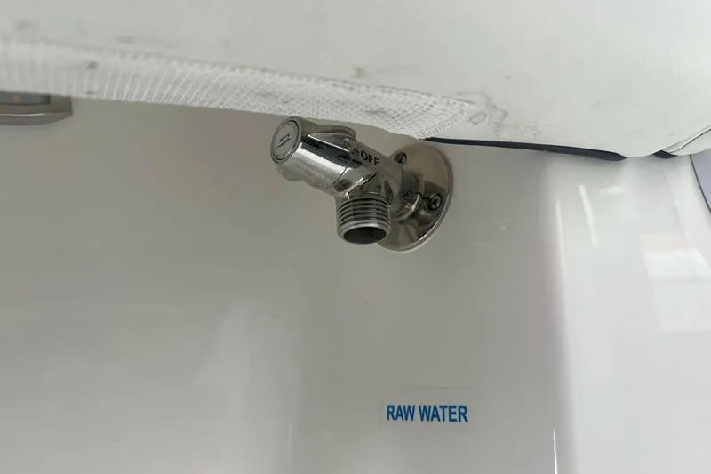 Slide: The Image of Raw water outlet on 2025 Tidewater 320 CC Adventure boat. - 63