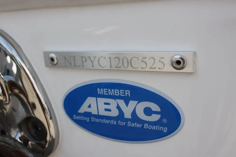 Slide: The Image of 2025 Tidewater 320 CC Adventure boat with ABYC member plaque and serial number. - 64