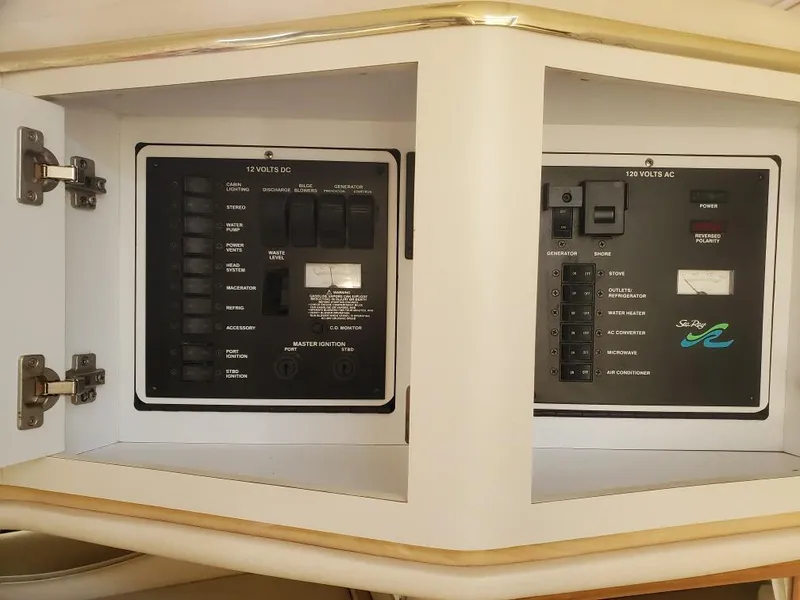 Slide: The Image of Electrical control panel on a 2000 Sea Ray 310 Sundancer boat. - 16