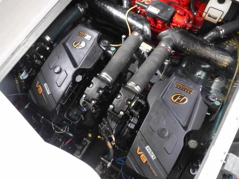 Slide: The Image of Engine compartment of a 2000 Sea Ray 310 Sundancer with twin V8 engines. - 25