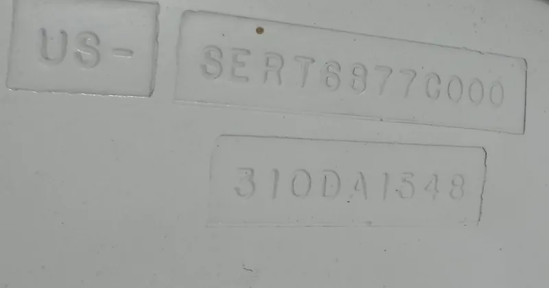 Slide: The Image of Hull identification number on 2000 Sea Ray 310 Sundancer boat. - 26