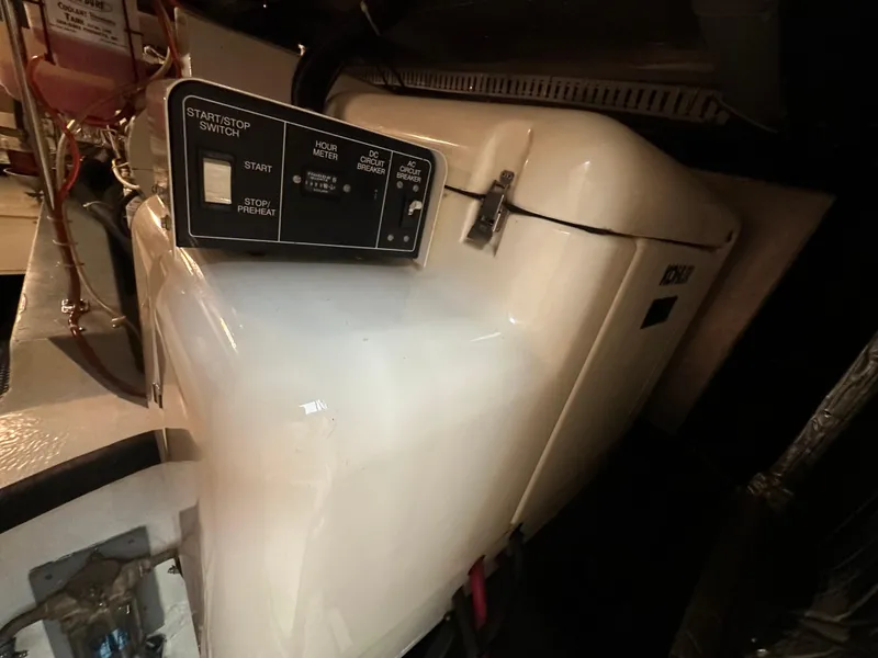 Slide: The Image of Interior of 1995 Carver 440 Aft Cabin Motor Yacht with cozy seating and entertainment area. - 21