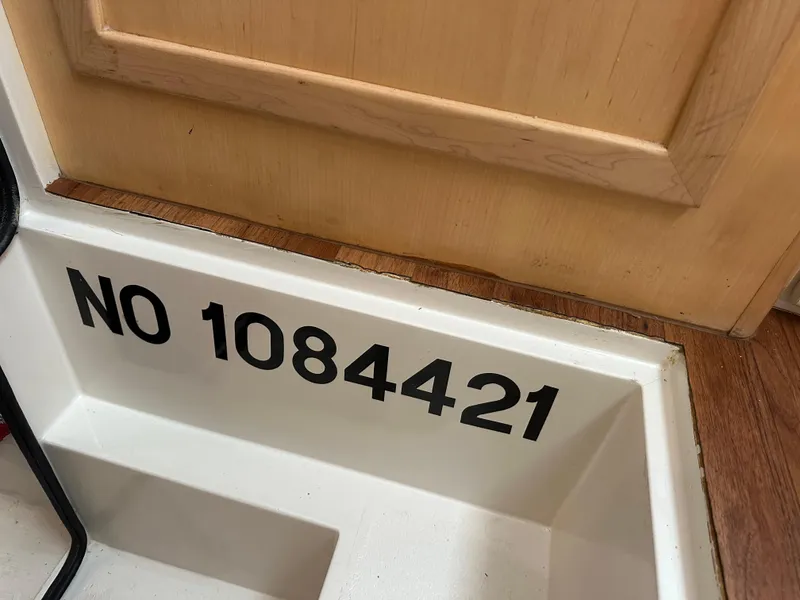 Slide: The Image of Cozy bedroom in 1995 Carver 440 Aft Cabin Motor Yacht with nautical-themed bedding. - 26