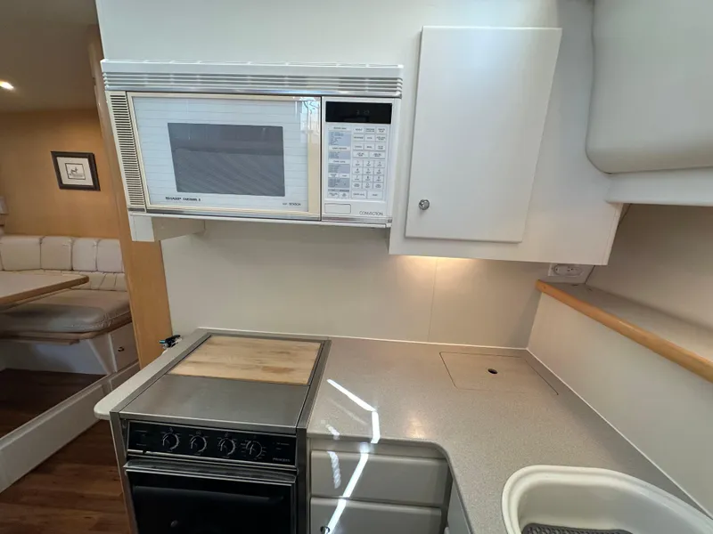 Slide: The Image of Interior of Carver 440 Yacht with bathroom and sleeping area. - 37