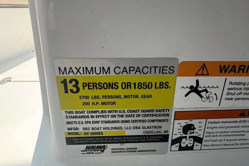 Slide: The Image of 2022 Glastron GTD 220 boat capacity label: 13 persons or 1850 lbs, 250 HP motor. - 17