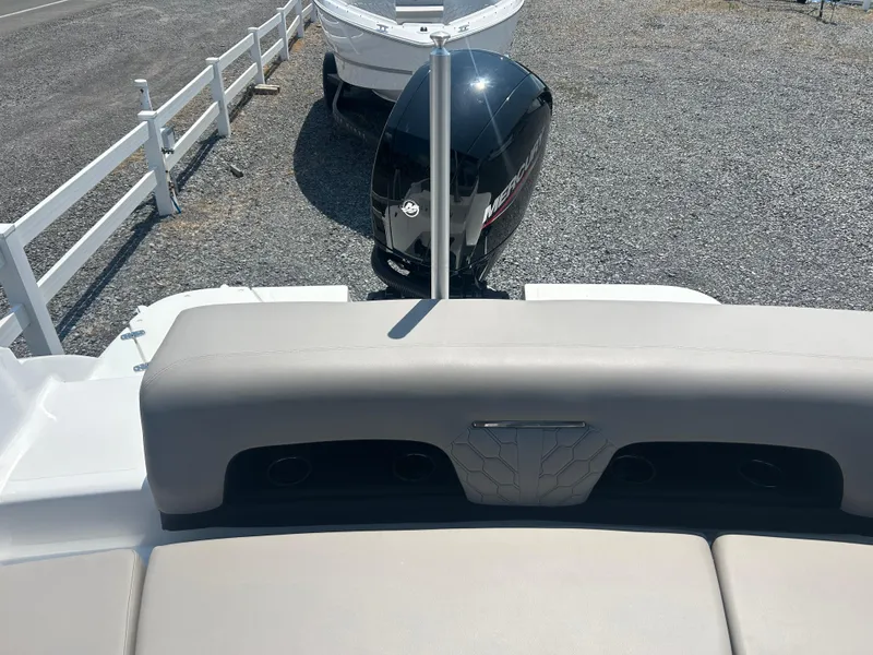 Slide: The Image of 2023 Four Winns H1 OB boat with Mercury outboard motor, rear seating view. - 23