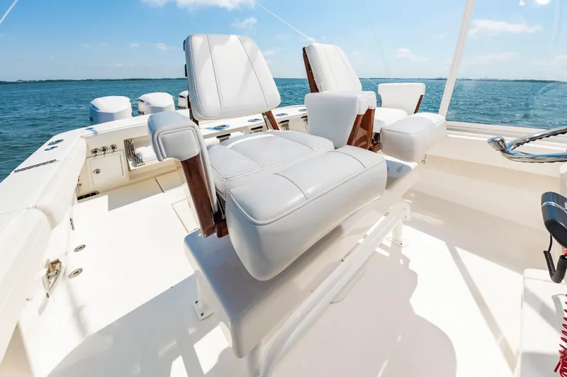 Slide: The Image of 2020 Regulator 34 Center Console boat with luxurious seating on open water. - 6