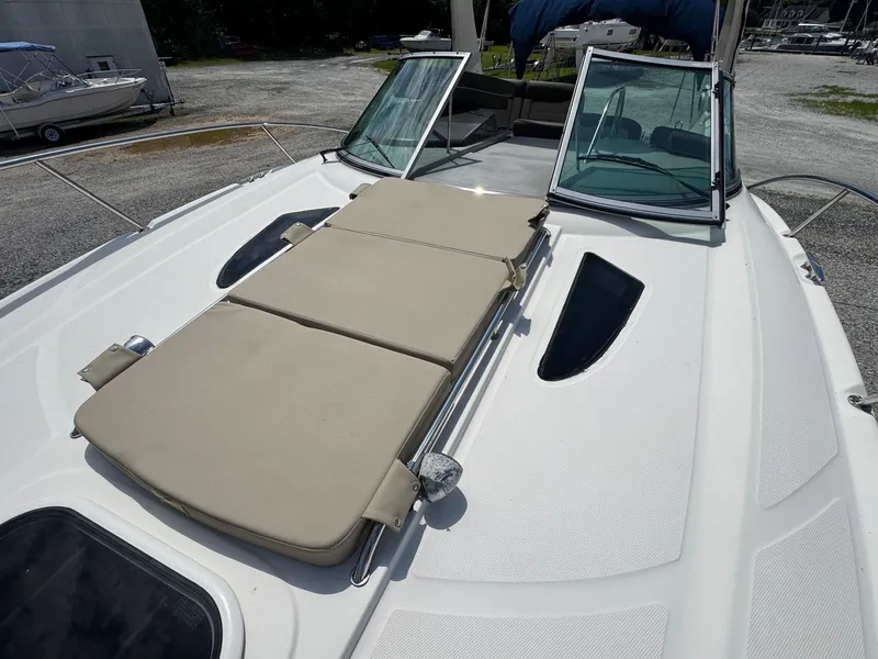 Slide: The Image of 2014 Sea Ray 330 Sundancer boat with sunpad on deck. - 17
