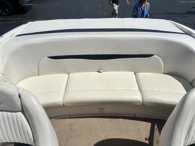 Slide: The Image of Interior seating of a 2002 Chaparral 196 SSi boat with white upholstery. - 20