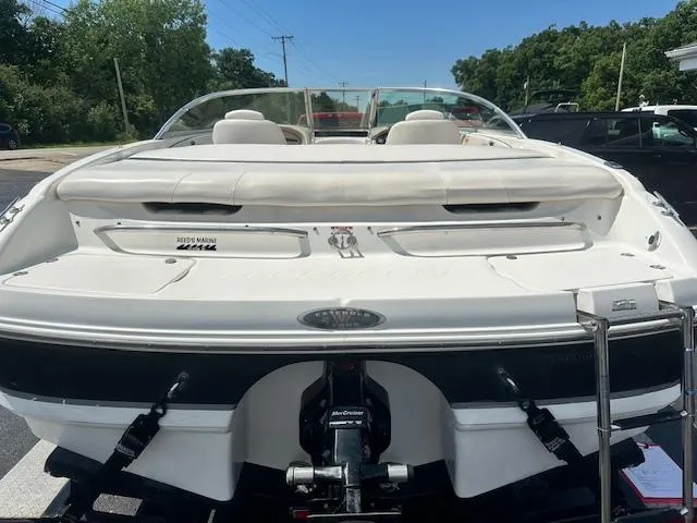 Slide: The Image of 2002 Chaparral 196 SSi boat, rear view, parked outdoors on a sunny day. - 5