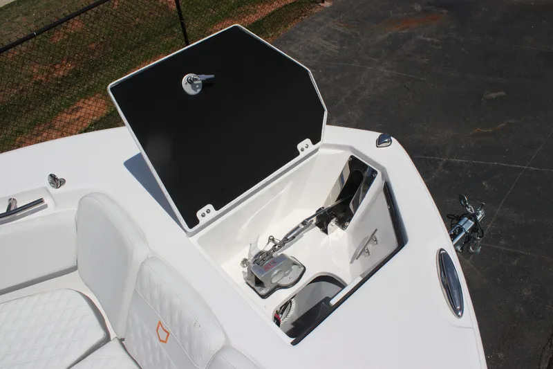Slide: The Image of 2025 Sea Fox 328 Commander boat anchor compartment with open hatch. - 12