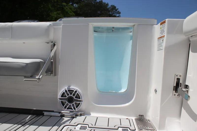 Slide: The Image of 2025 Sea Fox 328 Commander boat interior with seating and speaker detail. - 18