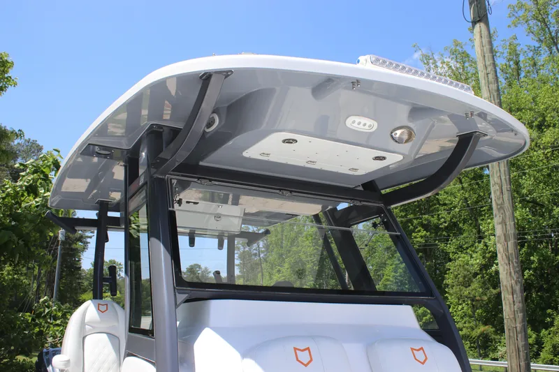 Slide: The Image of 2025 Sea Fox 328 Commander boat with sleek T-top design and modern features. - 21