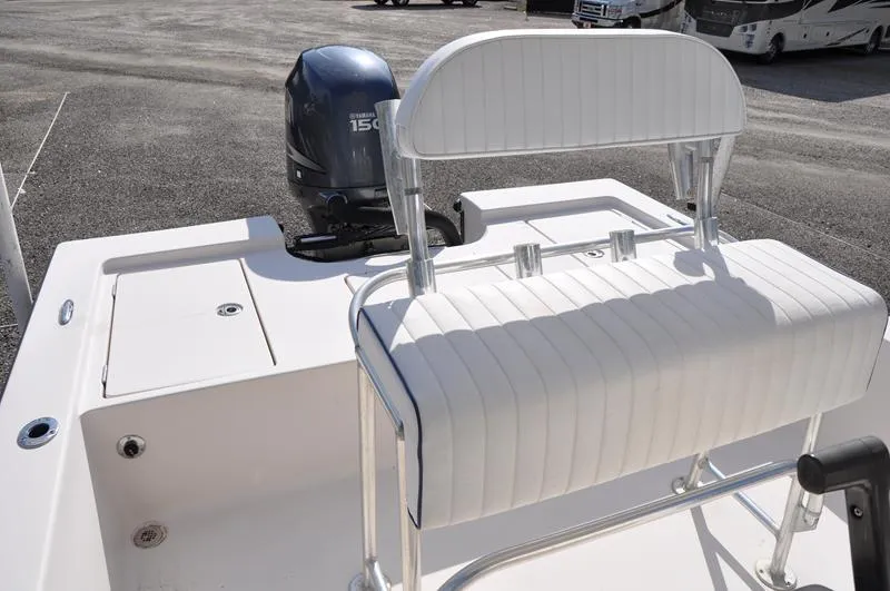 Slide: The Image of 2005 Pathfinder 2200 boat with Yamaha 150 engine and white seating. - 17