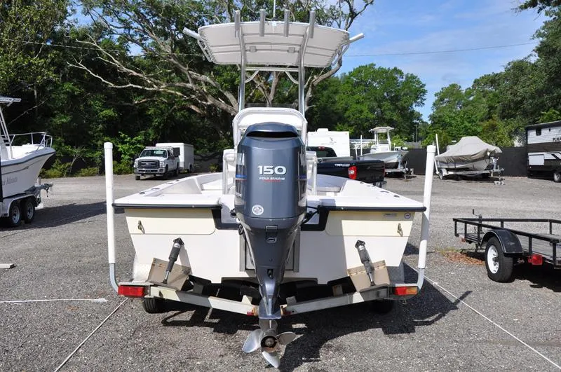 Slide: The Image of 2005 Pathfinder 2200 boat with Yamaha 150 engine, parked on a trailer. - 3