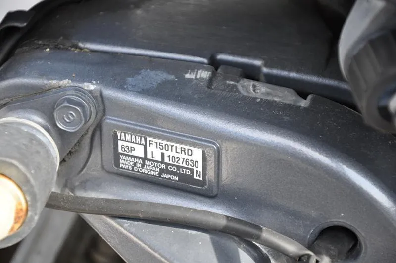 Slide: The Image of Close-up of a Yamaha F150TLRD engine label on a 2005 Pathfinder 2200. - 36