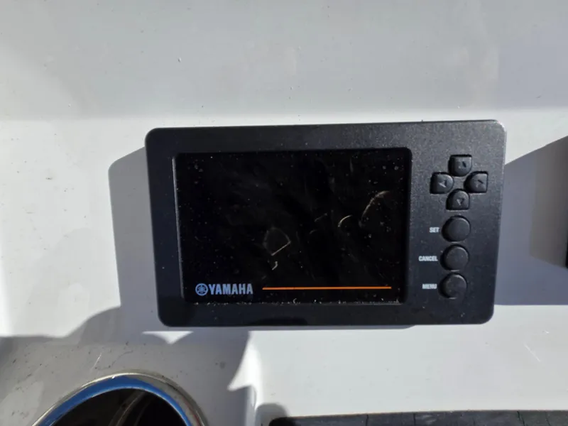 Slide: The Image of Yamaha display panel on 2017 Regulator 28 boat dashboard. - 30