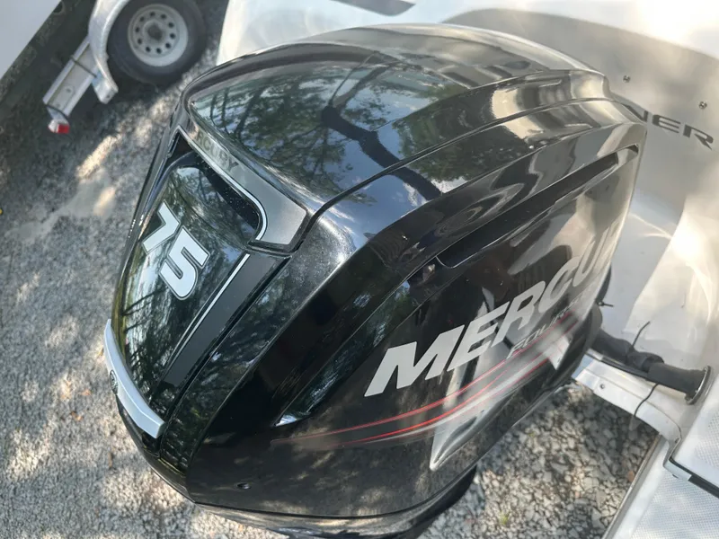 Slide: The Image of Mercury 75 horsepower outboard motor on 2019 Bayliner Element E16 boat. - 13