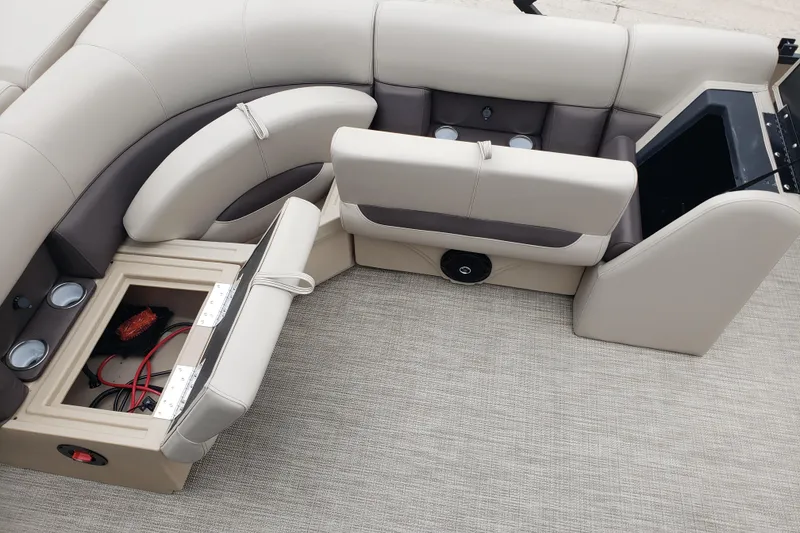 Slide: The Image of Interior seating and storage of 2026 Bentley Pontoons Legacy 243 Cruise boat. - 15
