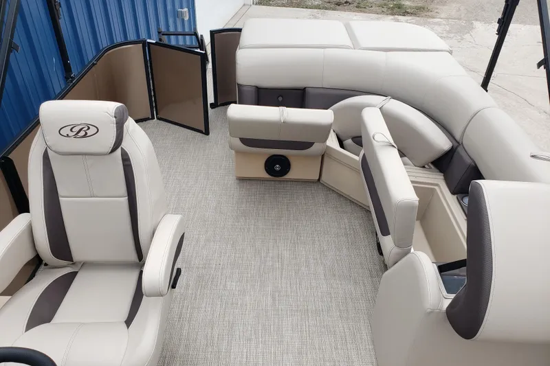 Slide: The Image of 2026 Bentley Pontoons Legacy 243 Cruise interior with luxurious seating and modern design. - 16