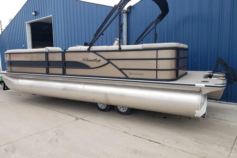 Slide: The Image of 2025 Bentley Pontoons Legacy 243 Cruise cup holders with ambient lighting. - 19