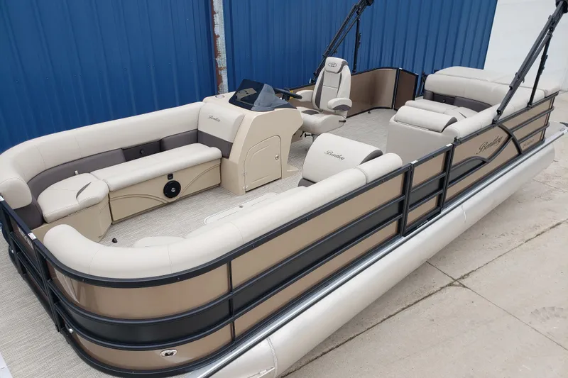 Slide: The Image of 2026 Bentley Pontoons Legacy 243 Cruise, beige interior, spacious seating, luxury pontoon boat. - 8