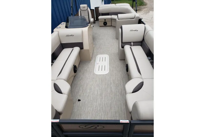 Slide: The Image of 2026 Bentley Pontoons Legacy 243 Cruise interior with spacious seating and elegant design. - 9