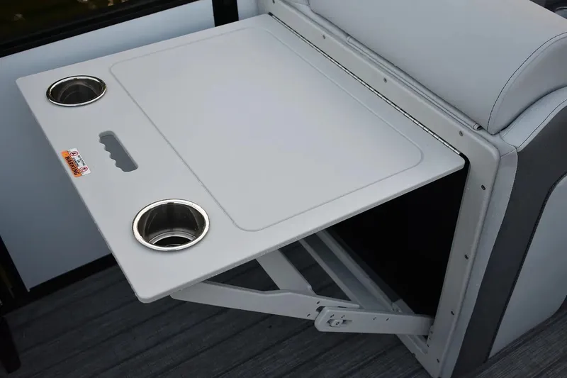 Slide: The Image of Foldable table with cup holders on 2025 Bentley Pontoons Elite 253 QSB. - 3