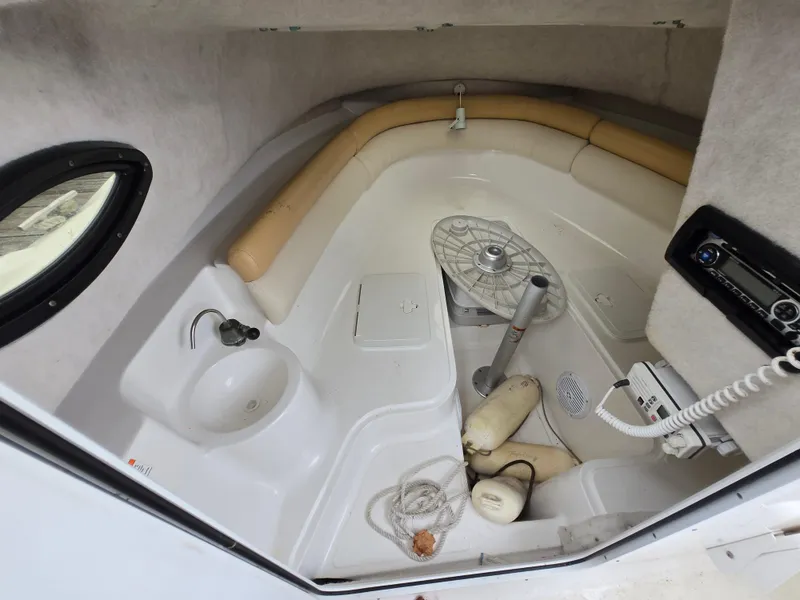Slide: The Image of Interior of 2010 Sea Fox 216 Walk Around boat with seating and equipment. - 8