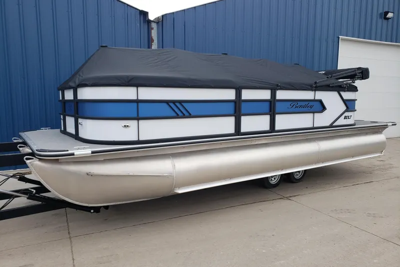 Slide: The Image of Control panel of 2025 Bentley Pontoons 223 Bolt with digital display and cup holder. - 10