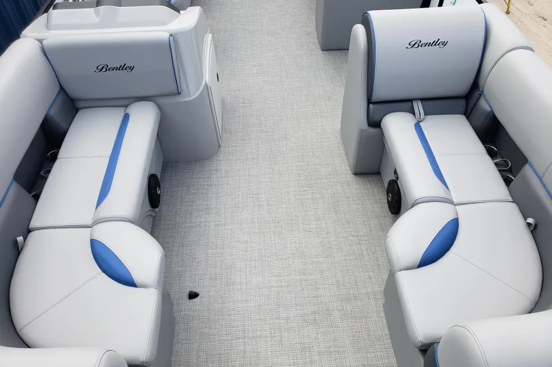 Slide: The Image of 2026 Bentley Pontoons 223 Bolt interior with luxurious gray and blue seating. - 11